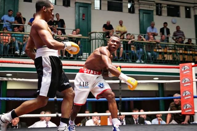 Linus Udofia launches another attack at York Hall - pic: Natalie Mayhew - Butterfly Boxing