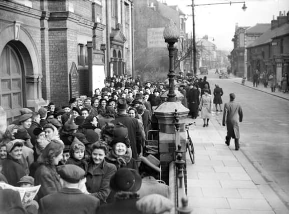 Queue outside High Town Methodist Church in 1946 7WYKRuU3iazLOUOPdn0F