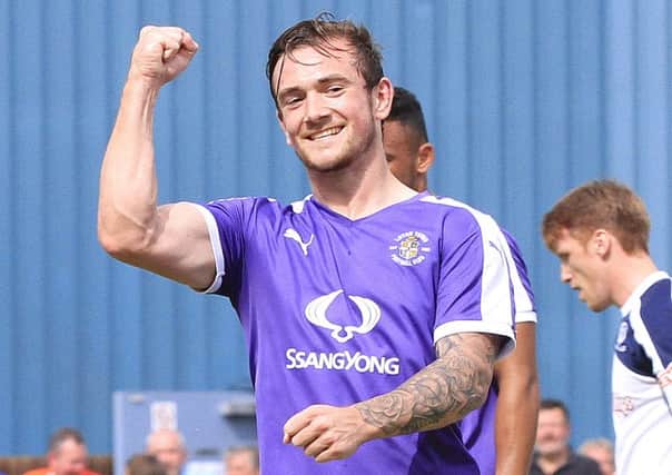 Jack Marriott has penned his new deal with Luton