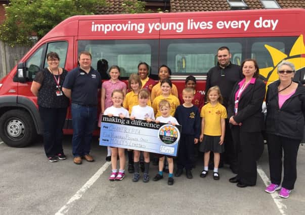 Convenience store donates Â£500 from MADL fund to Chantry Primary Academy to help with the running of the school minibus