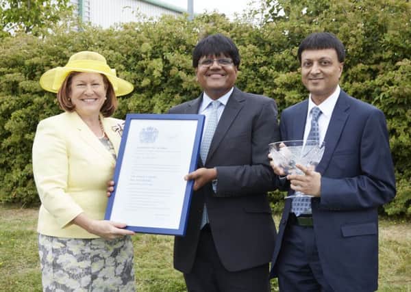 Bedfordshire Lord Lieutenant presents  Divyesh Kamdar with the Queen's Award for Enterprise