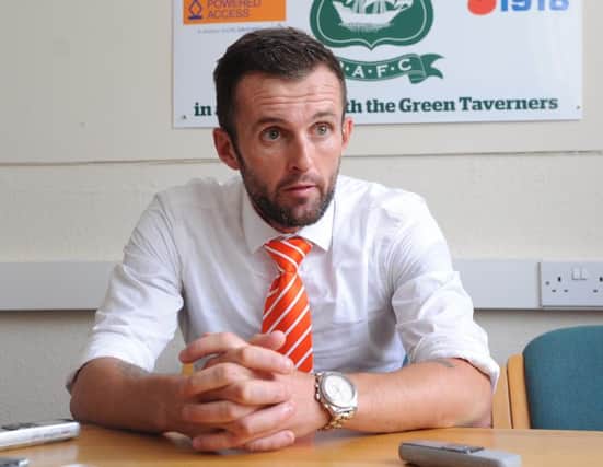 Hatters boss Nathan Jones speaks to the press after Town's 3-0 win at Plymouth