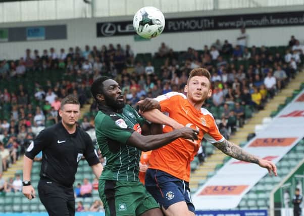 New Town signing Jordan Cook in action at Plymouth