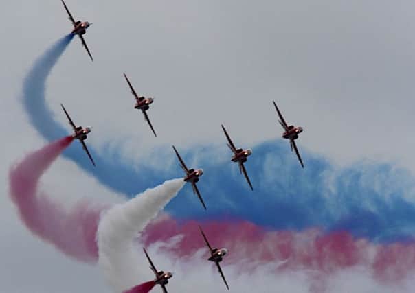 Hugh Wilton. took this picture of the Red Arrows trailing their distinctive smoke pattern SUS-140220-114121001