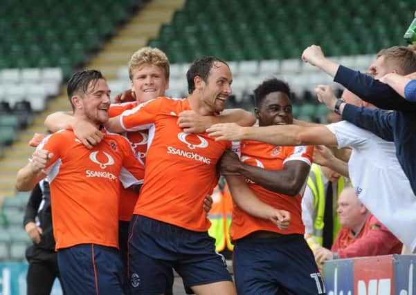 Danny Hylton celebrates his first goal in a Luton shirt