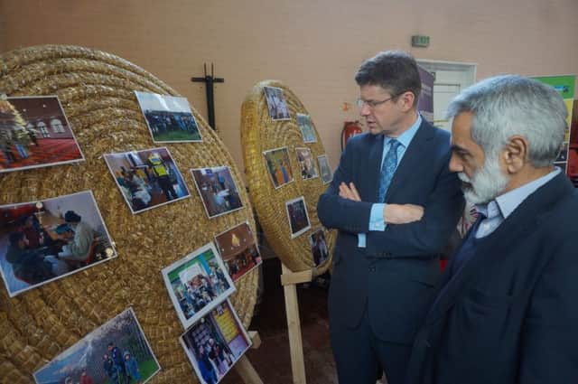 The Rt Hon Greg Clark MP visiting Luton last June looking at Luton Council of Faiths various community cohesion and integration projects with Chair Zafar Khan