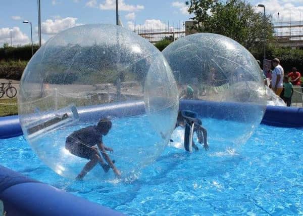 Water zorbs were a big attraction at Marsh Farm's  Area North Festival