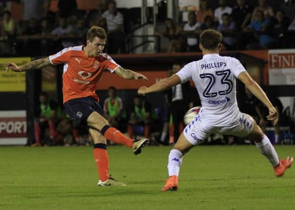 Glen Rea shoots for goal against Leeds United in the EFL Cup clash at Kenilworth Road