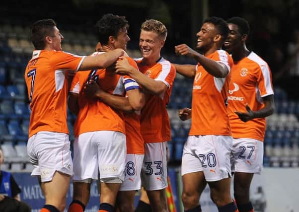 HAPPY HATTERS - Luton Town players celebrate the second goal at Gillingham, scored by Jonathan Smith (Pictures: Gareth Owen)