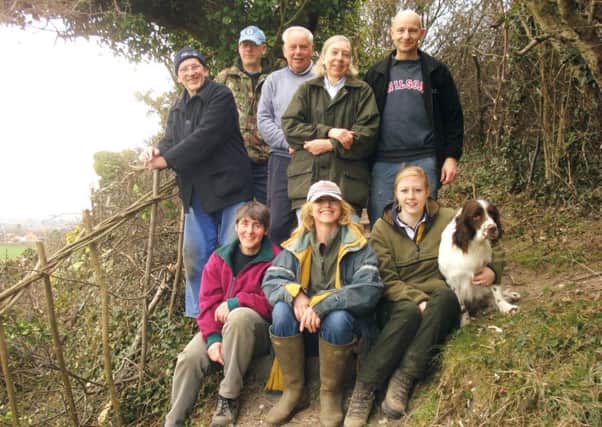 Wildlife volunteers take a break from hedgelaying at Galley and Warden Hills