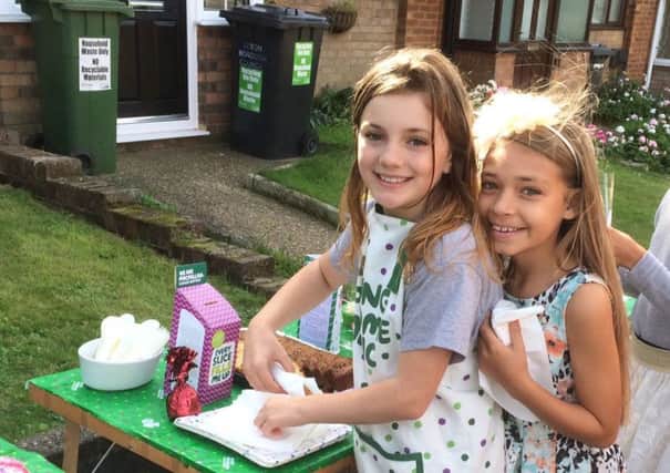 Hannah Parsons (left) and Gracy-Mai Golby who raised Â£273 for Macmillan Cancer Support