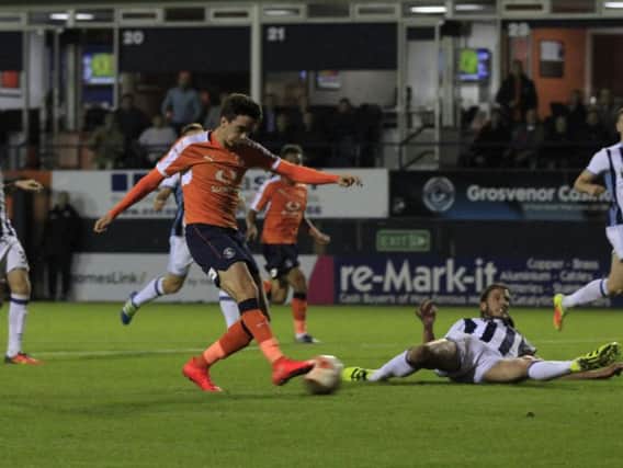 Alex Gilliead scores the opening for Luton Town against West Brom