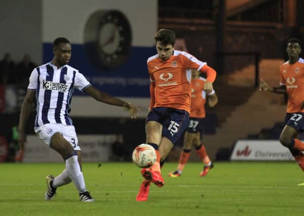 Alex Gilliead looks for a pass against West Brom