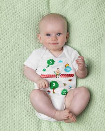 The babygrow with CPR instructions from St John Ambulance