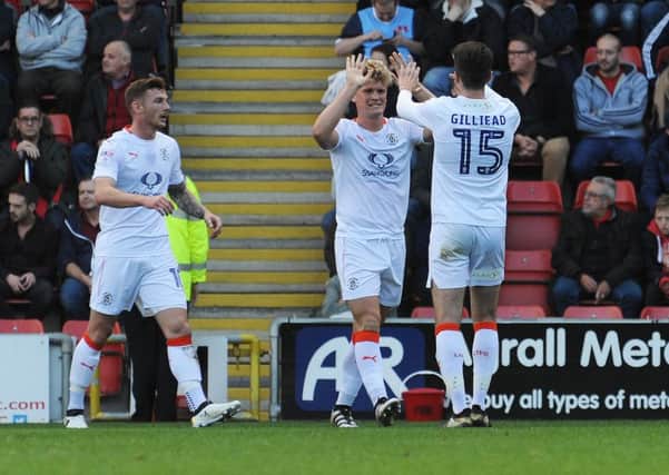 Cameron McGeehan celebrates his goal against Leyton Orient