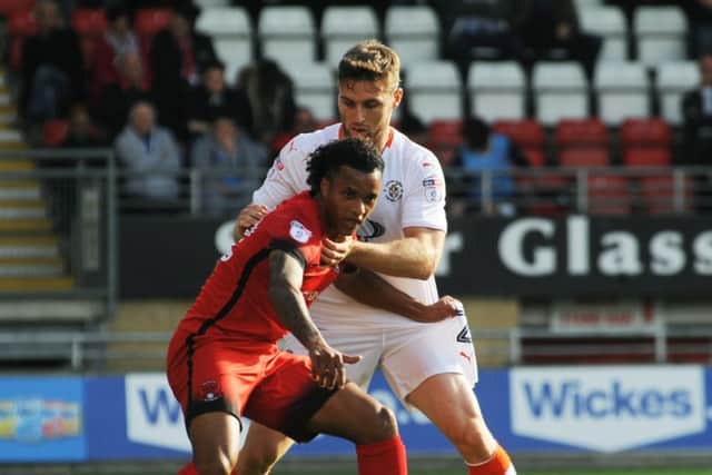 Stephen O'Donnell up against Orient's Sandre Semedo at the weekend