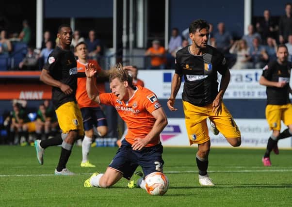 Craig Mackail-Smith is fouled in the area for Town's match-winning penalty against Mansfield last season