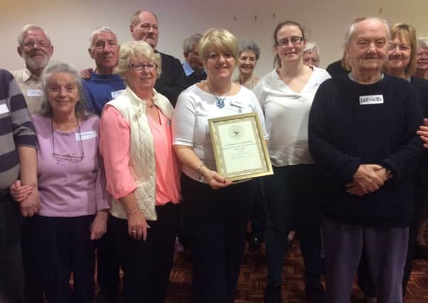Luton Dementia Ac tion Alliance chair Maria Collins with her Best Community Champion finalist cetificate