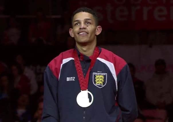 Luton's Jordan Thomas with his gold medal