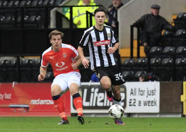 Johnny Mullins picks a pass against Notts County on Saturday