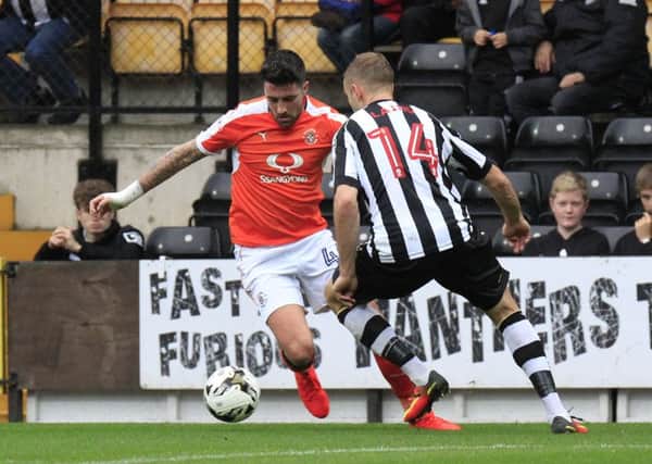 Alan Sheehan in action at left back against Notts County