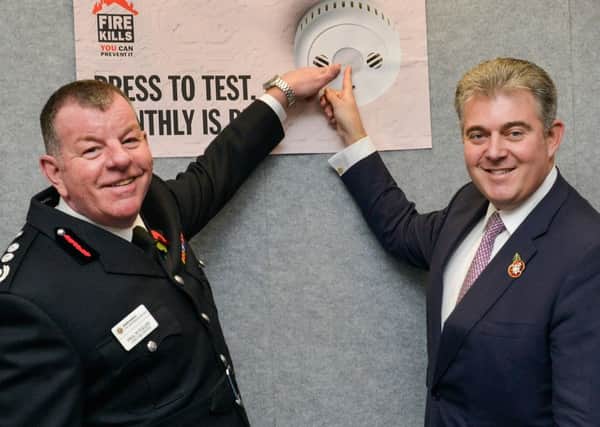 Chief fire officer Paul Fuller with Brandon Lewis MP