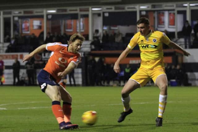 Craig Mackail-Smith's cross was diverted into the net by Millwall's Shaun Hutchinson.