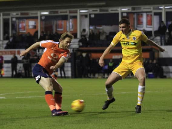 Craig Mackail-Smith's cross was diverted into the net by Millwall's Shaun Hutchinson.