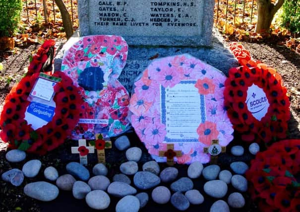 Wreaths and stones to honour Cheddington's war dead