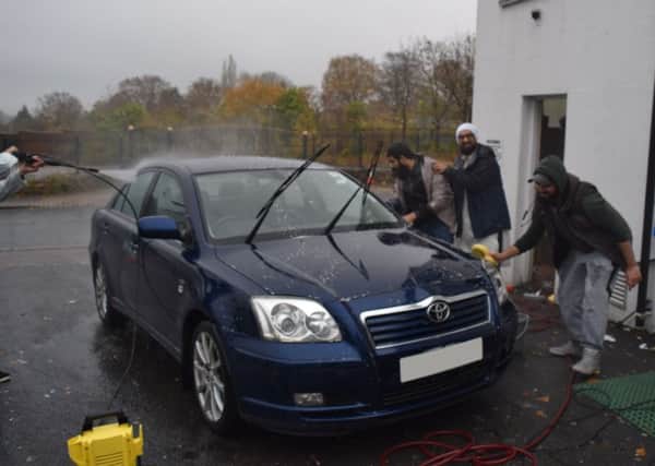 Volunteers raised more than Â£300 at a charity car wash at Luton's Al Hira Centre. The money will be used to provide winter relief for rough sleepers