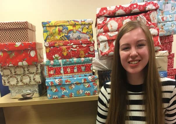 Herald&Post reporter Jo Gravett with Operation Christmas Child shoeboxes