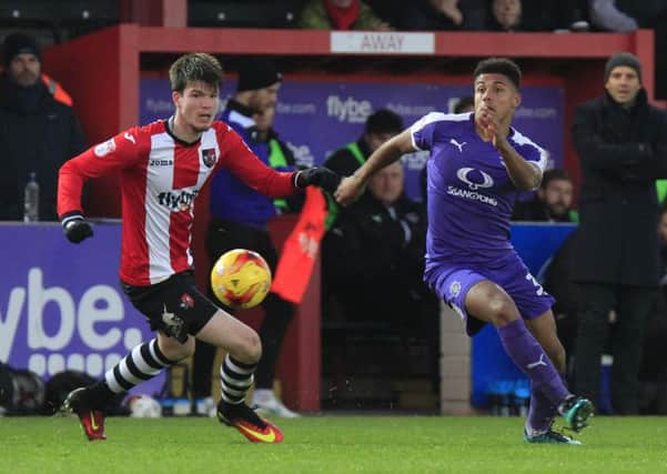 James Justin in action for Luton at Exeter