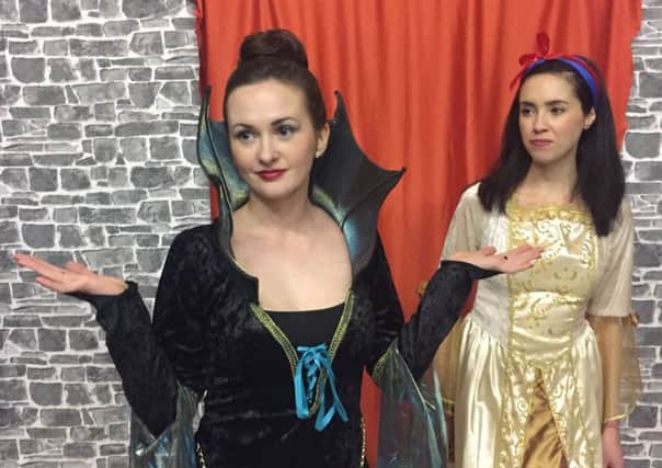 Boo the wicked Queen Imperia and cheer the heroes in Snow White