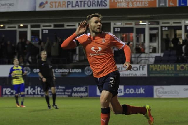 Stephen O'Donnell cups his ear to the fans after scoring against Solihull Moors