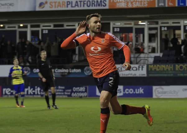 Stephen O'Donnell cups his ear to the fans after scoring against Solihull Moors