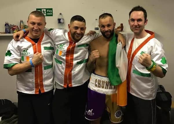 Michael Devine and his team celebrate victory at York Hall