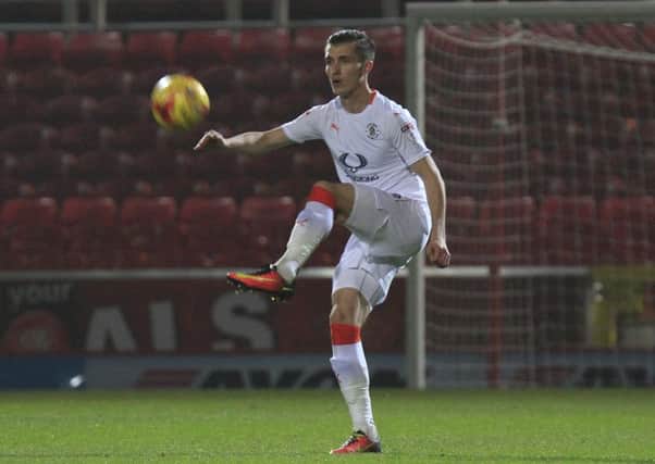 Hatters defender Dan Potts in action against Swindon on Tuesday night