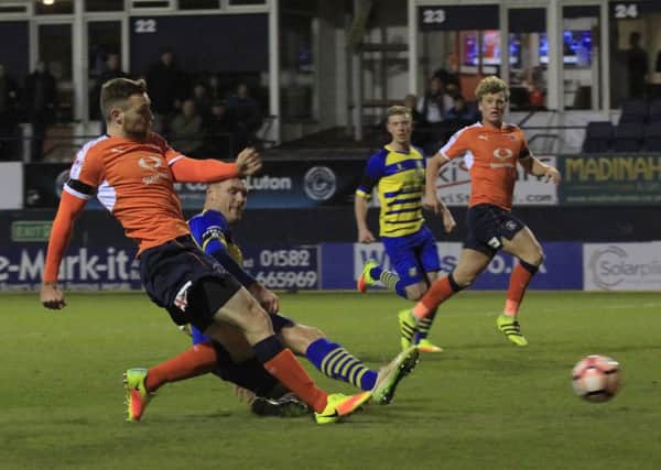 Hatters defender Stephen O'Donnell scores against Solihull