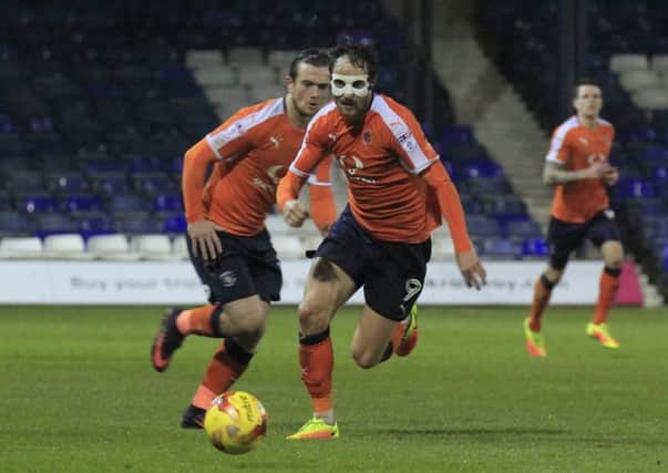 Danny Hylton will keep his mask on for the Hatters