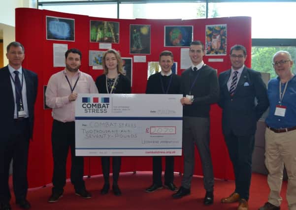 Luton company Leonardo presents Combat Stress charity with a cheque for Â£2,070