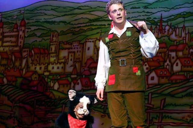 Chris Jenkins as Dick Whittington, with Sophie Hart as Tommy the Cat