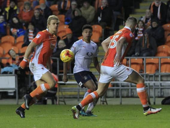 James Justin crosses for Cameron McGeehan to score against Blackpool
