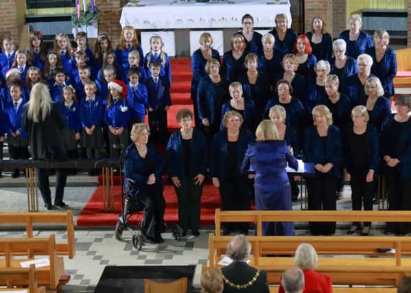 Caritas and the Hadrian Academy choir join forces at St Mary's in Dunstable in aid of Macmillan Cancer Support