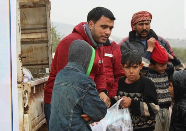 Luton's Quba Trust distributes warm clothing to those fleeing Aleppo