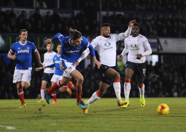 Isaac Vassell tries to break through late on for Luton at Pompey