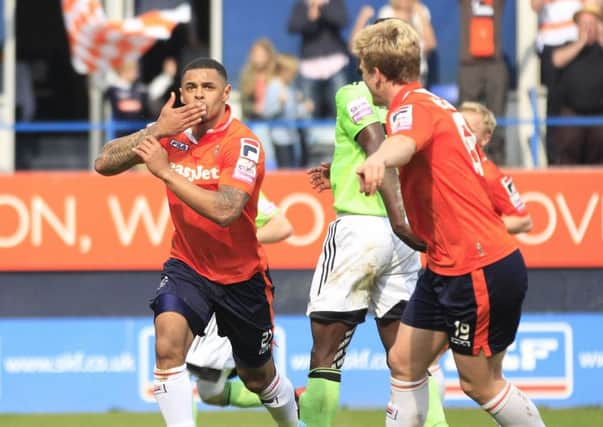 Andre Gray celebrates a goal for Luton with Cameron McGeehan