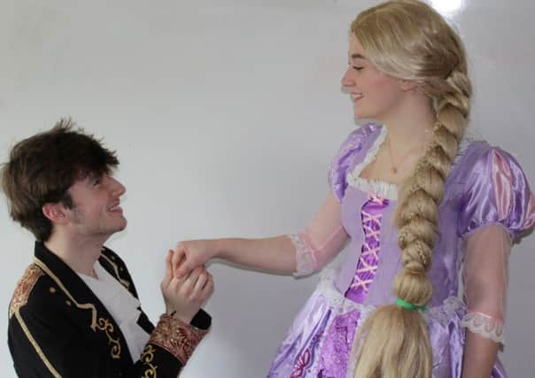 Carl Connelly as the Prince and Abigail Houghton as Rapunzel