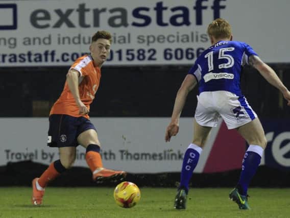 Hatters defender Jack Senior plays a ball forward against Chesterfield