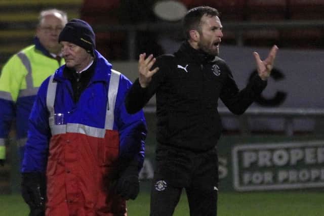 Town boss Nathan Jones shows his delight