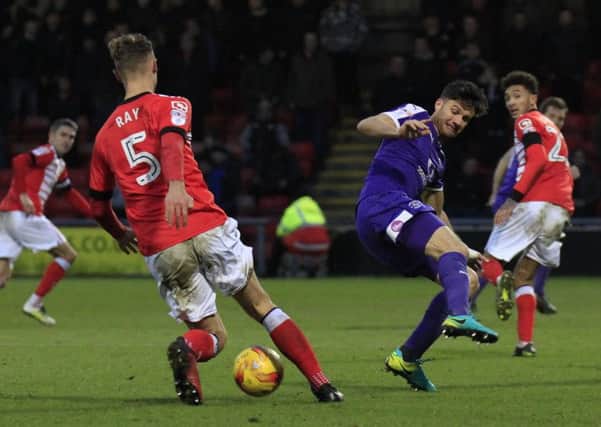 Jonathan Smith tries to stop another Crewe attack